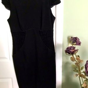 Allen B. Black dress with lace accents throughout